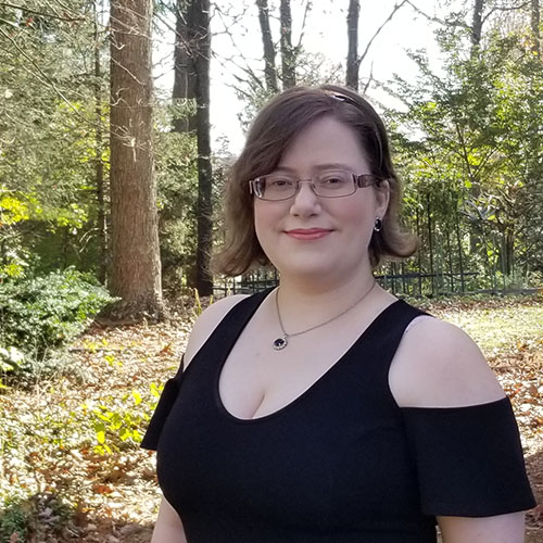 Real photo of Amy Vogelaar, Director of Technology at The Olive Book, showcasing her expertise in enhancing SAT prep through technology and content development.